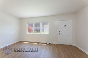 Long Beach apartment for rent - a living room with white walls and a white door