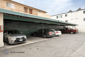 Hawthorne apartment for rent - A parking garage with a Lexus and a Toyota parked in it.