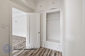 Los Angeles apartment for rent - a renovated closet with white cabinets and white doors