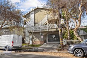 Long Beach apartment for rent - A white van is parked in front of a building with a sign that reads "Front Property Management.".