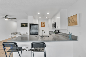 Long Beach apartment for rent - a kitchen with a counter top and a sink