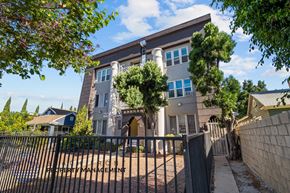 Los Angeles apartment for rent - a house with a fence and a gate in front of it
