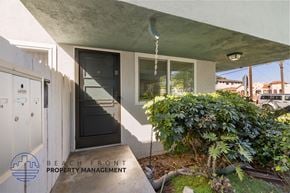 Redondo Beach apartment for rent - A house entrance with a staircase leading to the door.