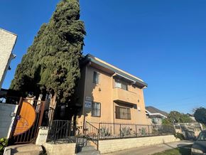 Los Angeles apartment for rent - a house with a large tree in front of it