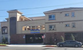 Harbor City apartment for rent - a building with a car parked in front of it