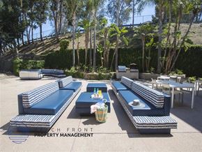 San Pedro apartment for rent - a lounge area with blue couches and tables