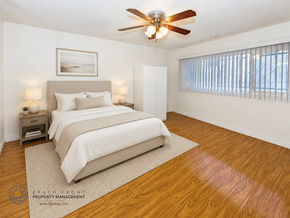 Los Angeles apartment for rent - A bedroom with a large bed and a ceiling fan.