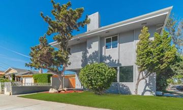 Hawthorne apartment for rent - a house with a lawn and trees in front of it