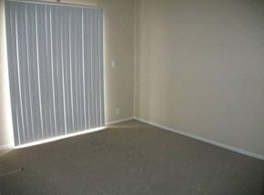 Long Beach apartment for rent - an empty living room with a large window