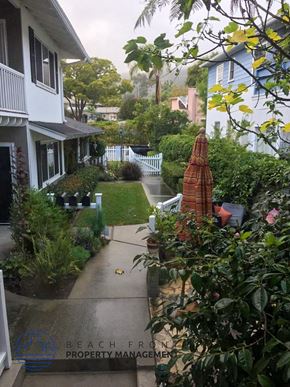 Laguna Beach apartment for rent - a walkway between a house and a garden