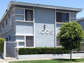Wilmington apartment for rent - A grey building with the number 1008 on it.