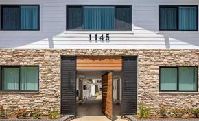 Long Beach apartment for rent - the front entrance of a building with an open door