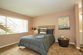 Torrance apartment for rent - a bedroom with a bed and a window