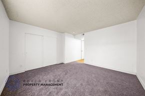 Inglewood townhouse for rent - a bedroom with white walls and carpet and white closets