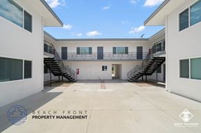 Torrance apartment for rent - a large building with two sets of stairs in front of it