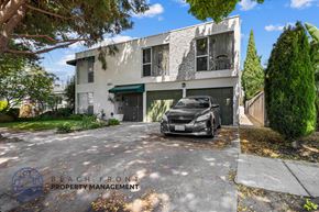 Long Beach apartment for rent - a car parked in front of a house