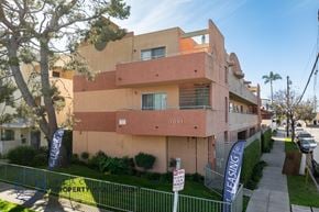 Long Beach apartment for rent - A multi-story building with a sign that says "1091" on it.