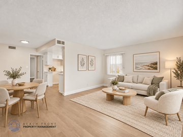 Inglewood apartment for rent - A living room with a dining table and chairs, and a couch with a throw pillow.