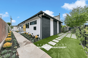 Venice apartment for rent - a home with a lawn and a sidewalk in front of it