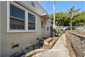 Santa Monica apartment for rent - a side view of a house with a sidewalk