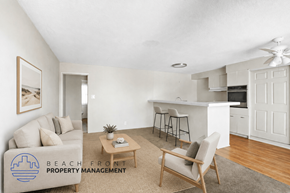 Wilmington apartment for rent - A living room with a couch, a chair, and a coffee table.