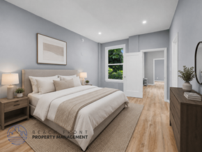 Los Angeles apartment for rent - A well-lit bedroom with a large bed and a view of the outdoors through a window.