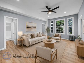 Los Angeles apartment for rent - A living room with a couch, chairs, and a ceiling fan.