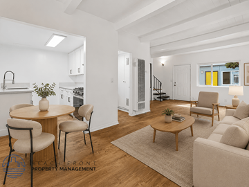 Orange apartment for rent - A living room with a dining table and chairs.
