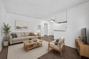 Huntington Park apartment for rent - A living room with a couch, chair, and coffee table.