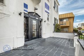 Los Angeles apartment for rent - A building entrance with a sign for Beach Front Property Management.