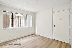 Los Angeles apartment for rent - A room with a white door and a window with blinds.