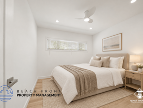 Torrance apartment for rent - A bedroom with a bed, a ceiling fan, and a window with blinds.