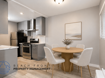 Los Angeles apartment for rent - A modern kitchen with a dining table set for four.