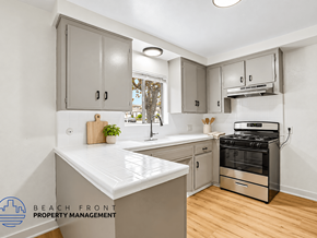 San Pedro apartment for rent - A kitchen with a stove and a countertop.