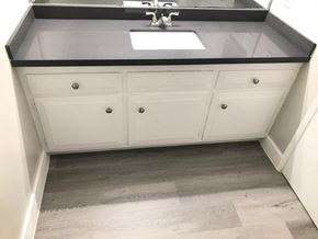 San Pedro apartment for rent - A bathroom with a sink and a cabinet.