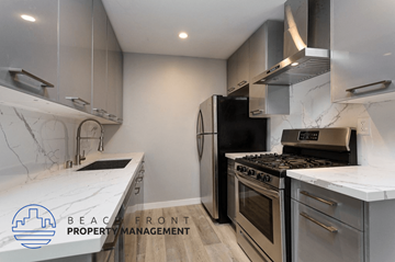 Los Angeles apartment for rent - an updated kitchen with stainless steel appliances and marble counter tops