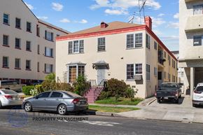 Los Angeles apartment for rent - a house with a red roof on a city street