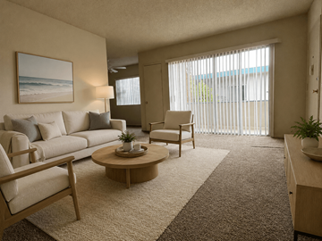 Torrance apartment for rent - A living room with a couch, chair, and a painting on the wall.