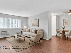 El Monte apartment for rent - A living room with a couch, chairs, and a dining table.