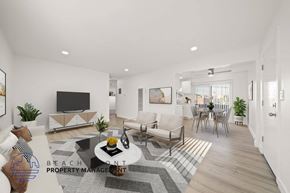 Tustin apartment for rent - A modern living room with a flat screen TV and comfortable seating.