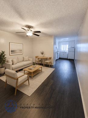 Hawthorne apartment for rent - A living room with a white couch, wooden coffee table, and a ceiling fan.