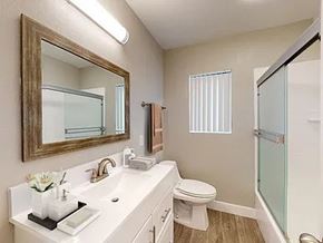 Anaheim apartment for rent - A bathroom with a white sink and toilet.
