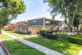 Anaheim apartment for rent - A building with a sign that says "Bellevue" on it.