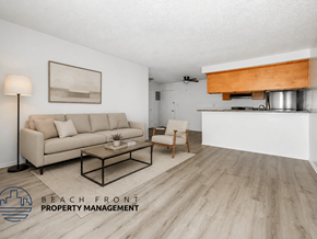 Los Angeles apartment for rent - A living room with a couch, a coffee table, and a painting on the wall.