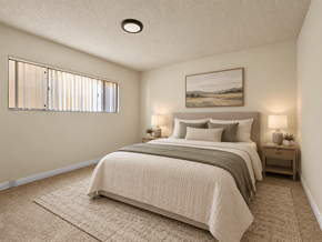 Inglewood apartment for rent - A bedroom with a large bed and a painting on the wall.