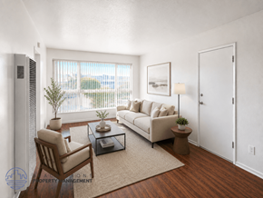 Lynwood apartment for rent - A well-lit living room with a sofa, armchair, and a coffee table.