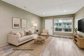 Los Angeles apartment for rent - A living room with a couch, chair, and coffee table.