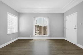 Long Beach apartment for rent - A room with a window and a door.