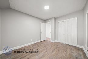 Cudahy apartment for rent - the living room of a new home with white walls and wood flooring