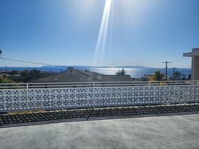 San Pedro apartment for rent - A sunny day with a clear blue sky and sunlight shining through the clouds.